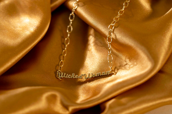Eighteen karat gold plated brass chain necklace with script phrase Wicked Woman