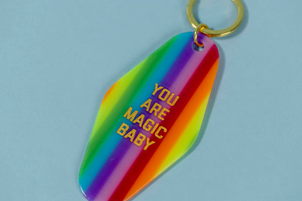 Rainbow stripe hotel keychain tag with gold quote You Are Magic Baby, sold by Golden Gems
